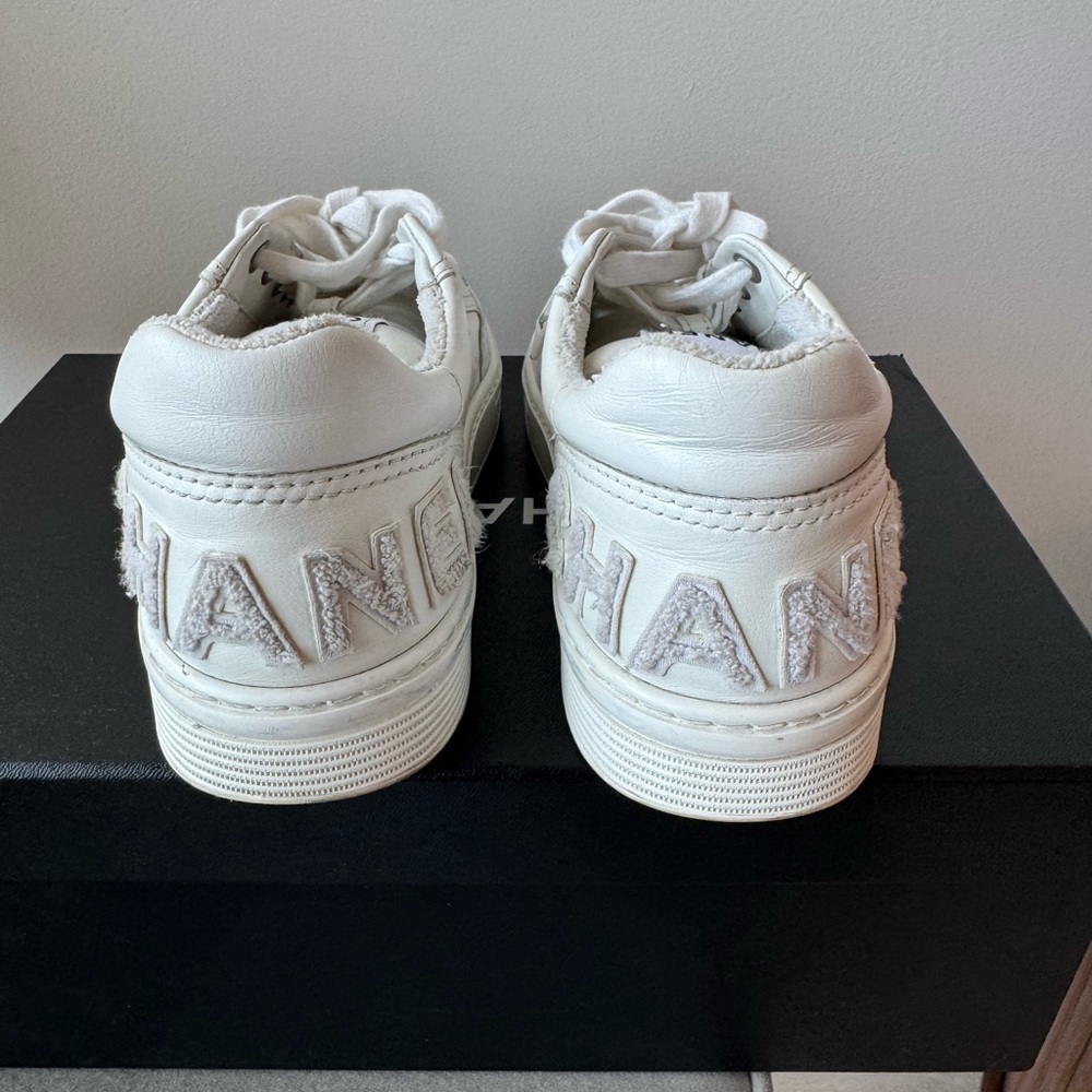 White Chanel Sneakers with Embroidered Logo